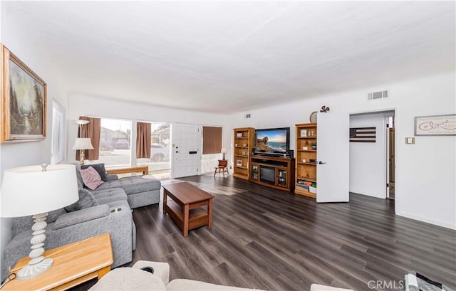 living room featuring dark hardwood / wood-style floors