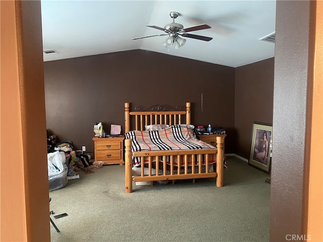 carpeted bedroom with lofted ceiling and ceiling fan