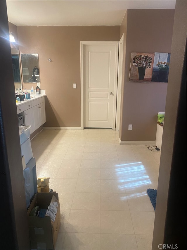 bathroom with vanity and tile patterned floors