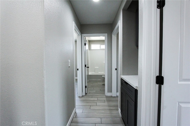 hallway featuring light hardwood / wood-style flooring