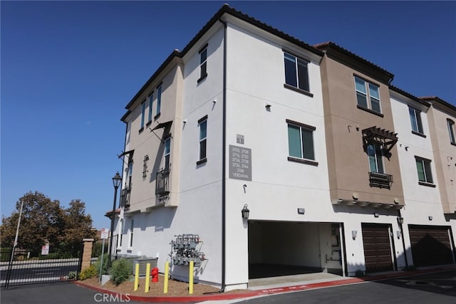 view of building exterior featuring a garage