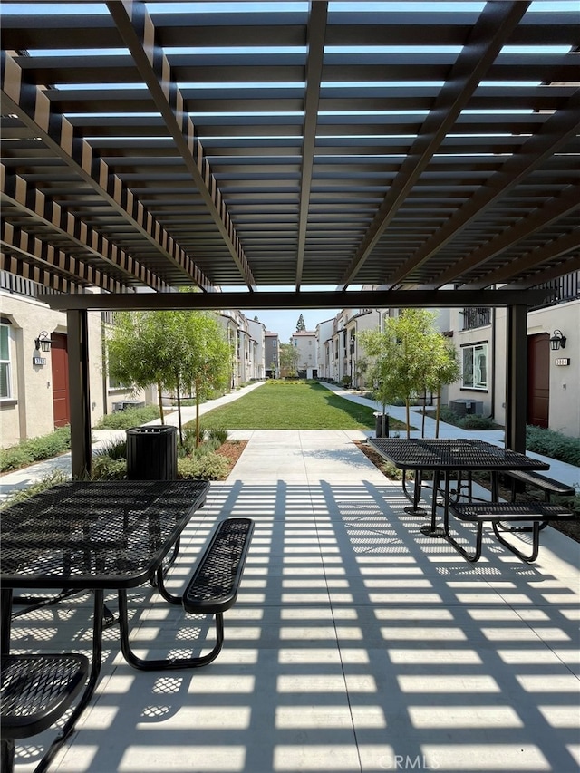 exterior space featuring a pergola and a patio area