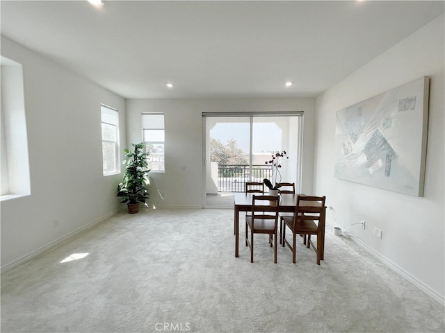 view of carpeted dining space