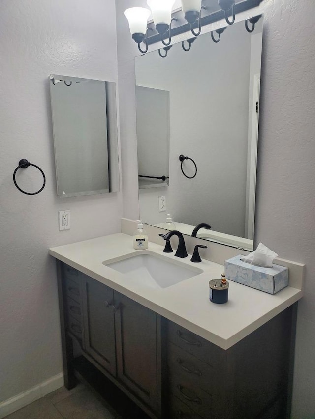 bathroom with vanity and tile patterned flooring