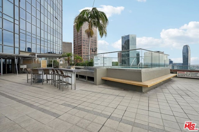 view of patio / terrace with an outdoor bar