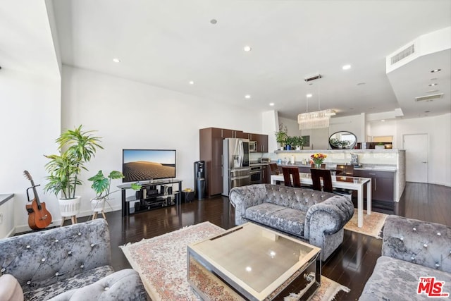 living room featuring dark hardwood / wood-style floors