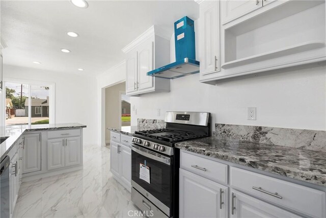 kitchen with white cabinets, dishwasher, wall chimney range hood, gas range, and stone counters