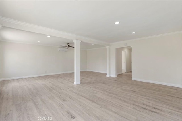 basement featuring ceiling fan, crown molding, and light hardwood / wood-style floors