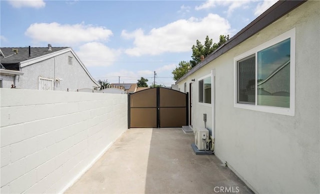 view of property exterior featuring a patio area