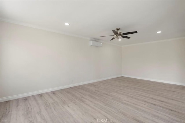 unfurnished room featuring a wall unit AC, ceiling fan, crown molding, and light wood-type flooring