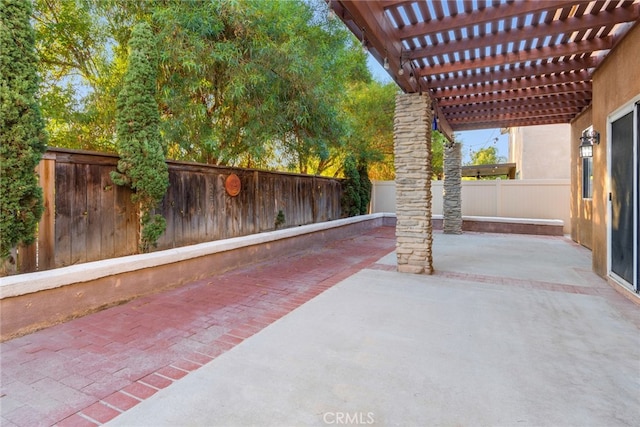 view of patio featuring a pergola