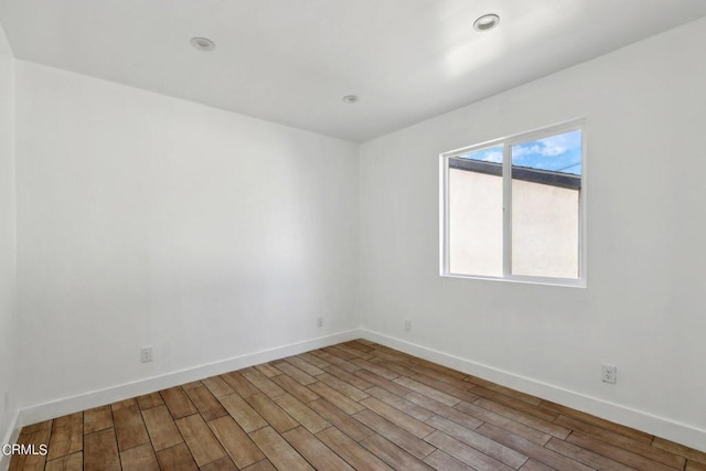 unfurnished room featuring light hardwood / wood-style flooring