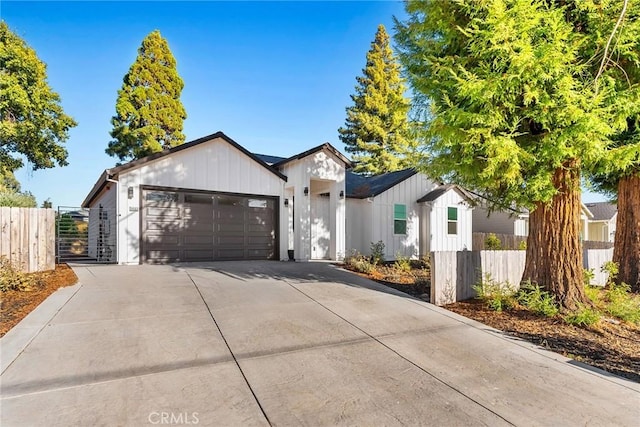 modern farmhouse featuring a garage