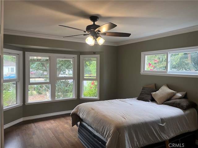 bedroom with multiple windows and ceiling fan