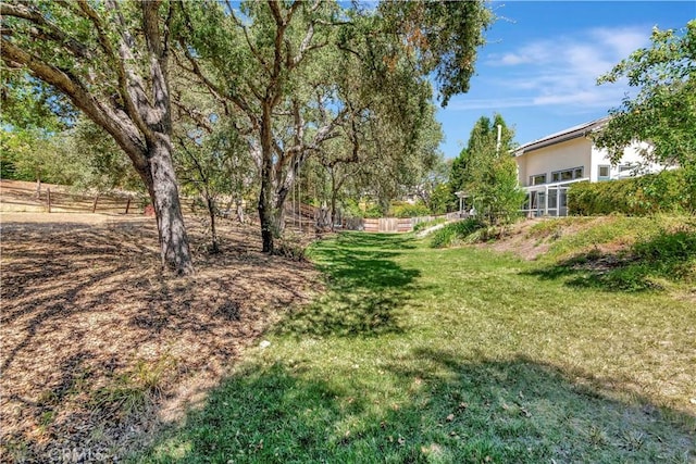 view of yard featuring fence