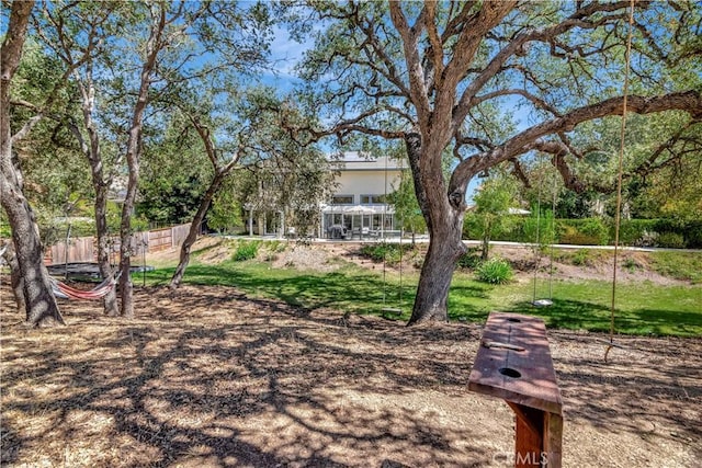 view of yard with fence