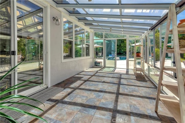 unfurnished sunroom with a healthy amount of sunlight