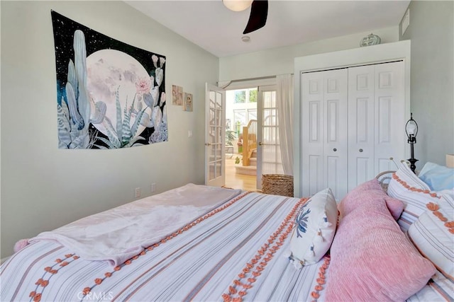 bedroom with a closet, visible vents, and ceiling fan