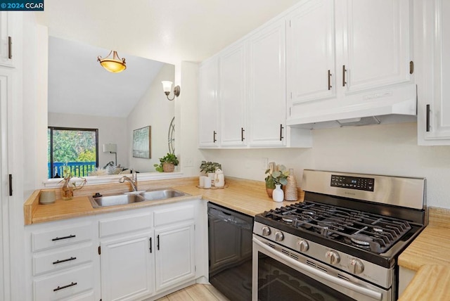 kitchen with dishwasher, white cabinetry, sink, and stainless steel gas range