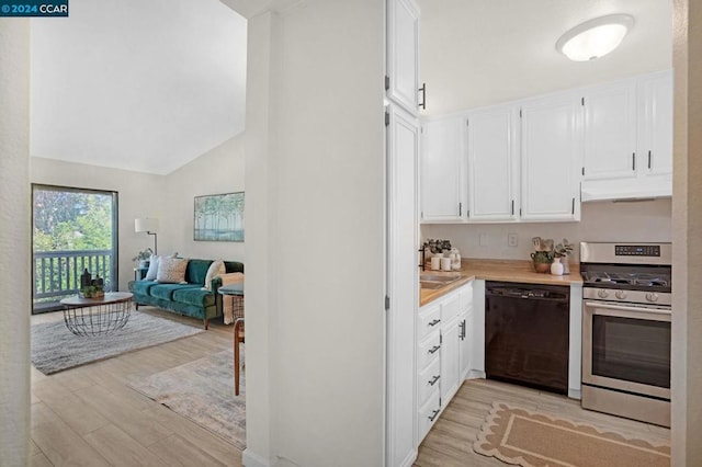 kitchen featuring white cabinets, dishwasher, stainless steel stove, and light hardwood / wood-style floors