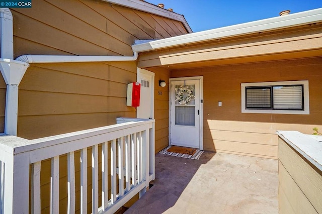 entrance to property with covered porch