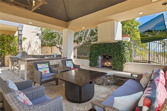 11755 Collar Ave, Tustin, CA 92782 - view of patio featuring an outdoor living space with a fireplace and area for grilling