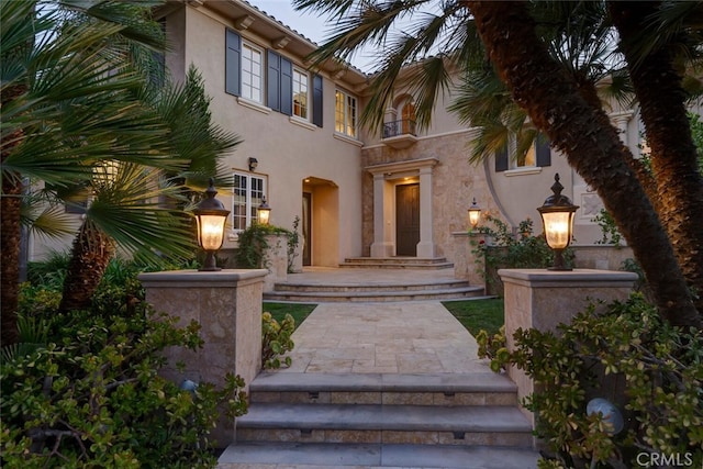 11755 Collar Ave, Tustin, CA 92782 - doorway to property featuring stucco siding