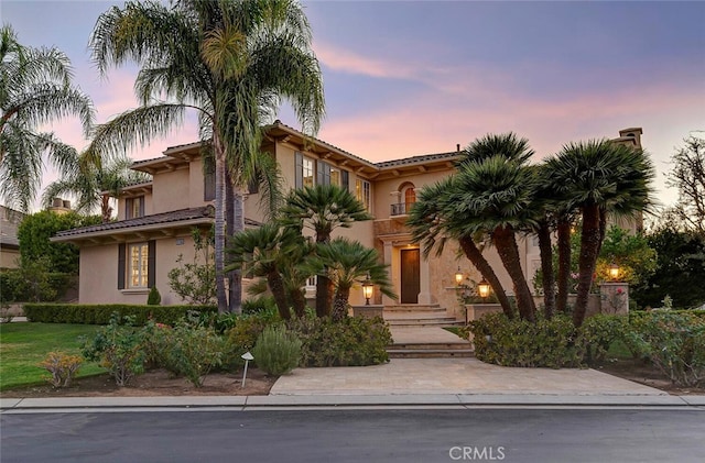11755 Collar Ave, Tustin, CA 92782 - mediterranean / spanish house with stucco siding and a tile roof
