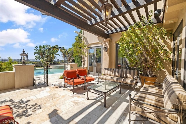 view of patio / terrace with a pergola and outdoor lounge area