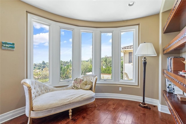 11755 Collar Ave, Tustin, CA 92782 - living area featuring baseboards and dark wood-style floors