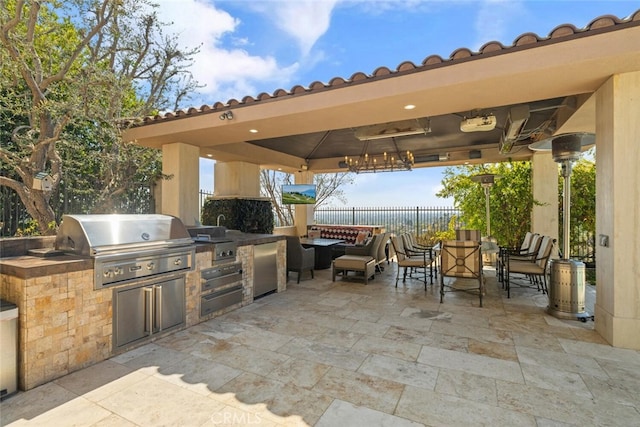 11755 Collar Ave, Tustin, CA 92782 - view of patio featuring a gazebo, an outdoor kitchen, and outdoor dining area