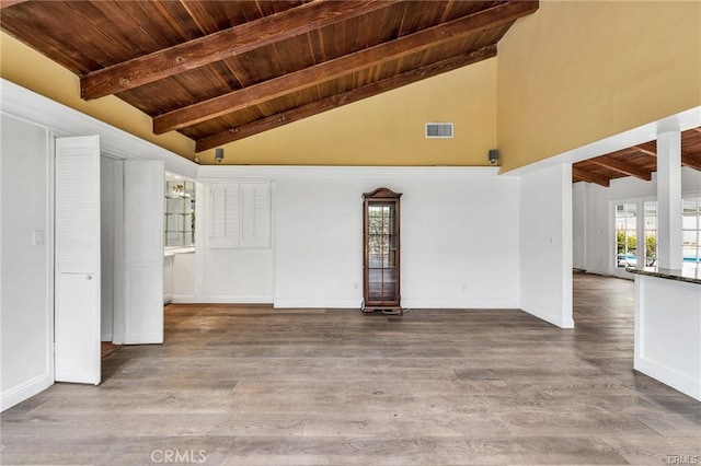 unfurnished living room featuring wooden ceiling, high vaulted ceiling, hardwood / wood-style flooring, and beamed ceiling