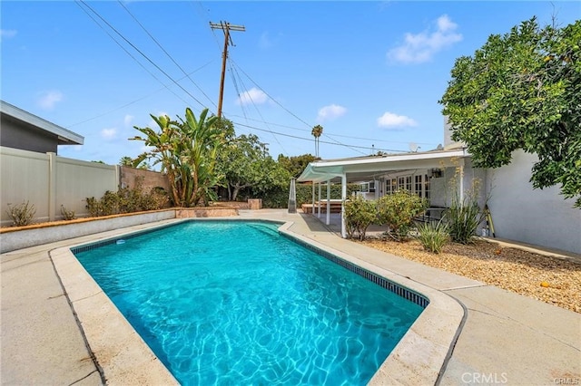 view of pool with a patio area