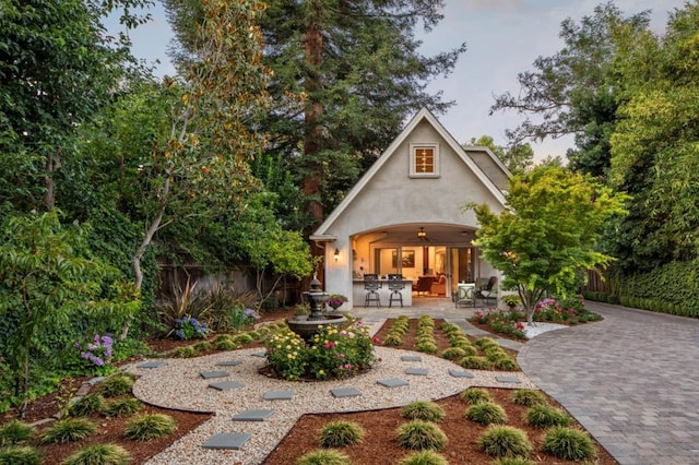 exterior space with a patio and ceiling fan