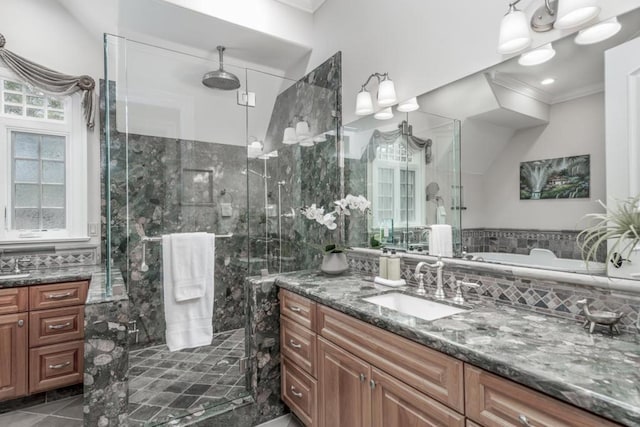 bathroom with vanity, ornamental molding, a shower with shower door, and tile patterned flooring