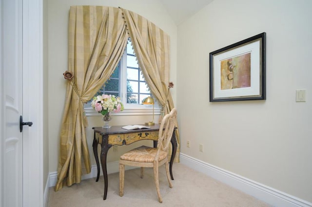 home office with carpet flooring and lofted ceiling