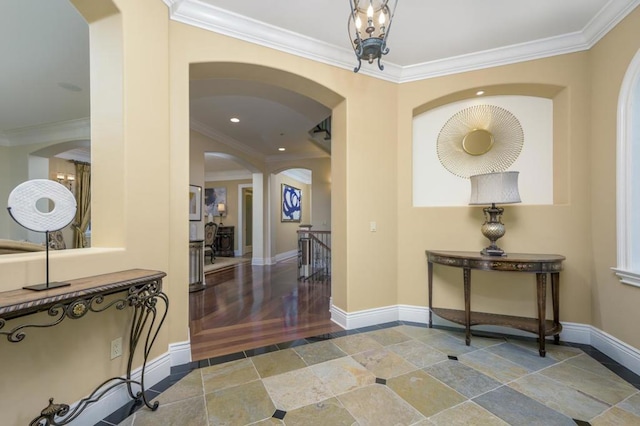 hall featuring ornamental molding and hardwood / wood-style flooring