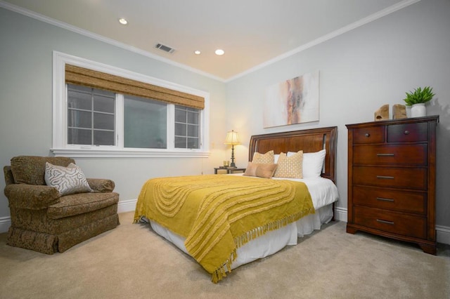 bedroom with crown molding and light colored carpet