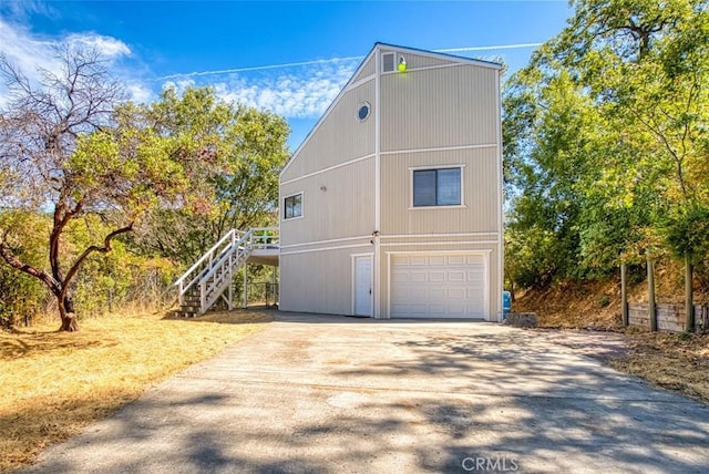 view of property exterior featuring a garage