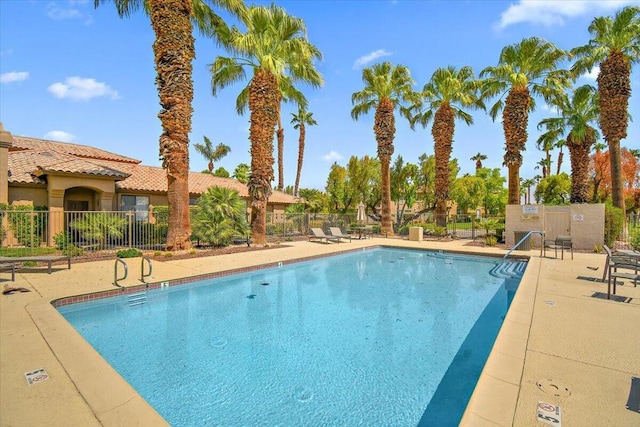 view of swimming pool featuring a patio