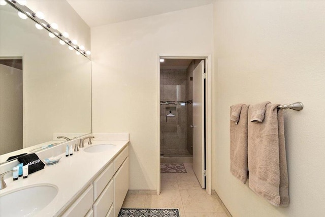 bathroom with vanity and an enclosed shower