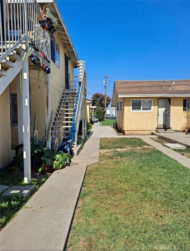 view of home's exterior featuring a yard