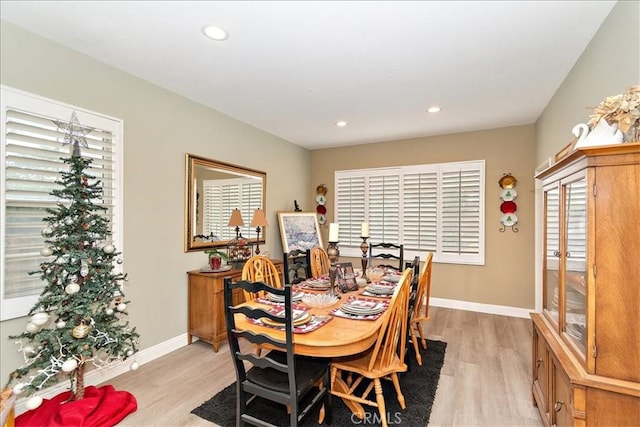 dining space featuring light hardwood / wood-style floors