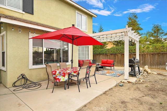 view of patio / terrace with a pergola and a grill