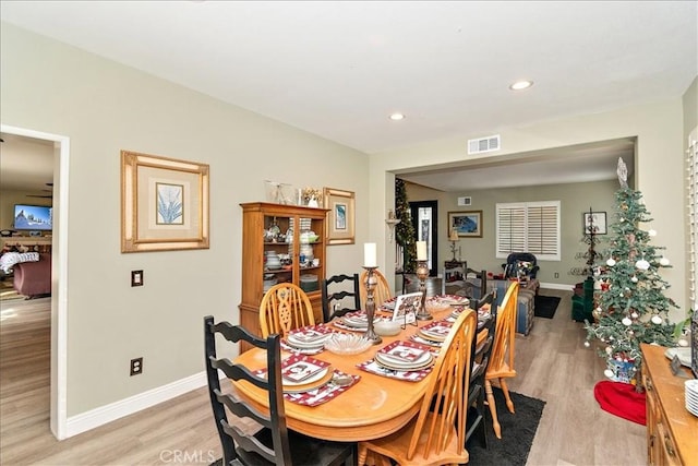 dining room with light hardwood / wood-style floors