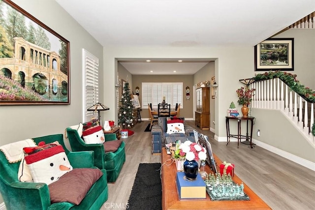 living room with light hardwood / wood-style floors