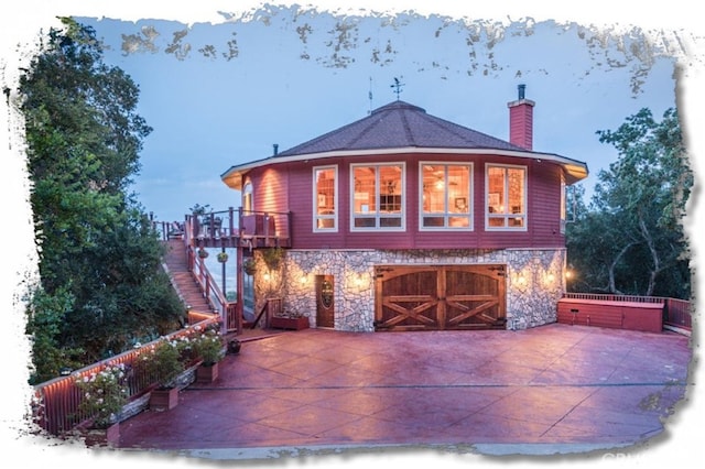 view of front of home featuring a garage