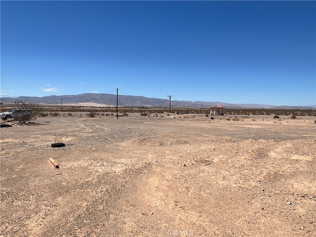 view of mountain feature featuring a rural view