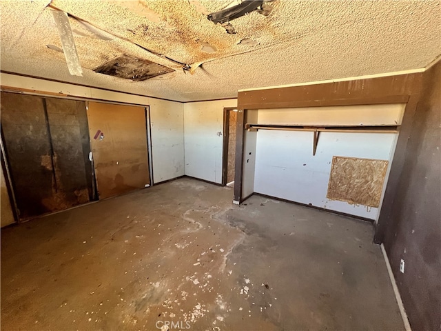 basement with a textured ceiling