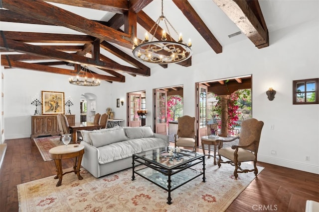 living room with high vaulted ceiling, beamed ceiling, a chandelier, and hardwood / wood-style flooring